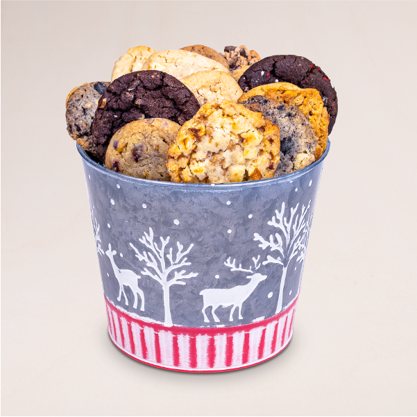 This wonderful metal Christmas cookie bucket is filled with 18 of our gourmet cookies in your choice of specially curated assortment or favorite flavor and delivered straight to your door.